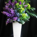 purple orchids blue delphinium green viburnum