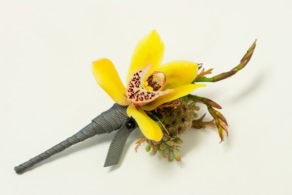 yellow orchid boutonniere