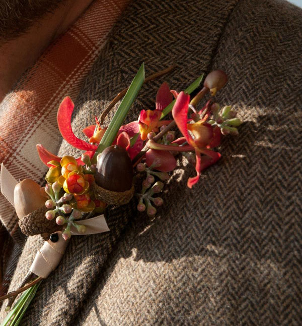 Designed by Lisa of Petals and Promises. Birch twig, Acorns, sprigs of Naked Seeded Euc, Bittersweet with florets of Black Story Orchids and Bear Grass 15.00