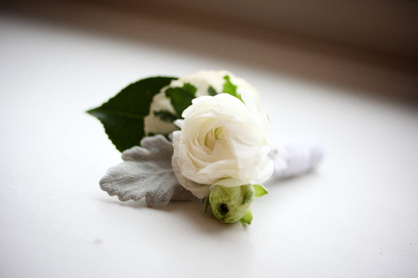 Ranunculus, arailia foliage, dusty miller Salal, chiffon ribbon, accent applique $15.00