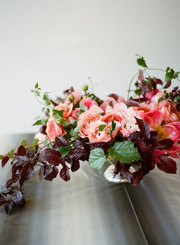 Designed by Ariella Chezar, Coral peonies, coral garden roses, plum branches