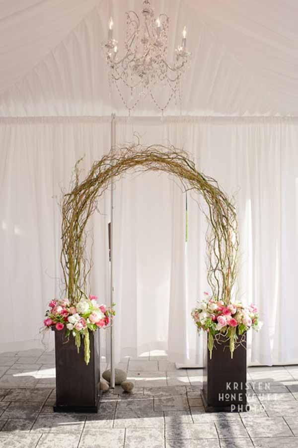 Floressence, arch of curly willow with flowers at the base