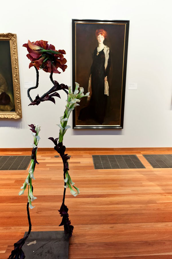 Bouquets to Art, Robert Henri, Lady in Black with Spanish Scarf (O in Black with a Scarf), 1910.  Oil on canvas. Fine Arts Museums of San Francisco, gift of the M.H. de Young Museum Society from funds donated by the Charles E. Merrill Trust. Floral design by Natalie Bowen Design.  Photograph Â© Greg A. Lato / latoga photography