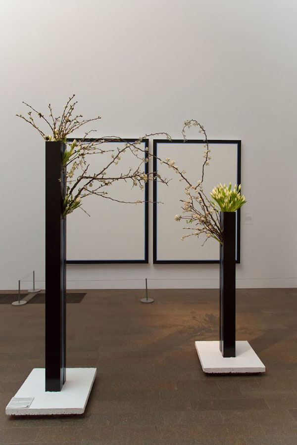 Bouquets to Art San Francisco, Jo Baer, Untitled (Vertical Flanking Diptych-Blue), 1966-1969. Acrylic on canvas, Fine Arts Museums of San Francisco, gift of Diane B. Lloyd-Butler. Floral design by Natalie Bowen Designs. Photograph: Â© Greg A. Lato / latoga photography