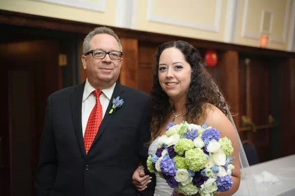 Stacey of Roots Flowers and Events - Bridal bouquet of purple and green flowers