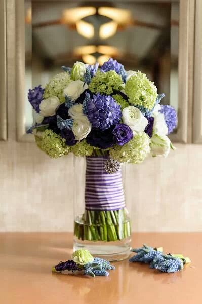 Stacey of Roots Flowers and Events - Bridal bouquet of purple and green flowers