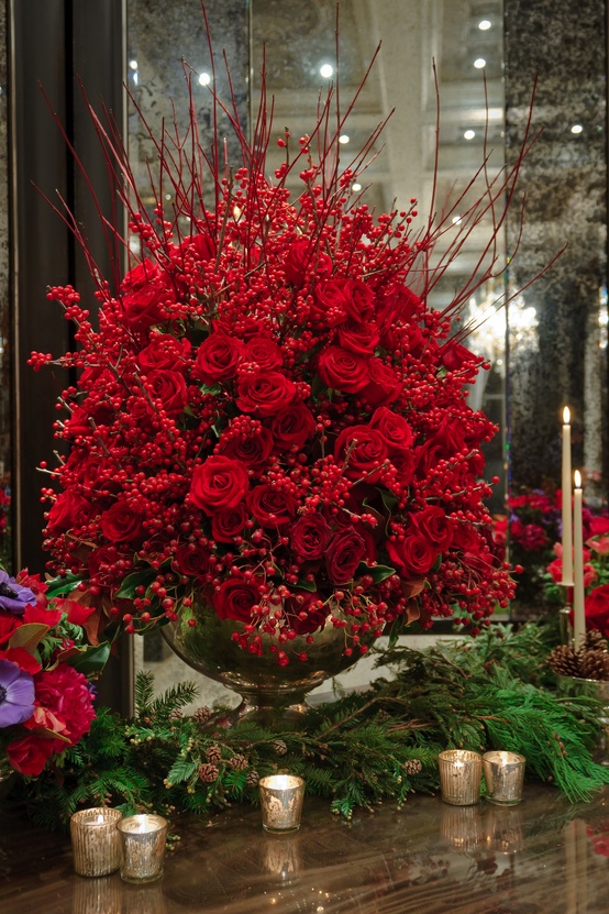 Red Flower arrangement with roses, dogwood and ilex berries