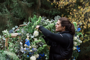 Amy from Gather designing a floral arch
