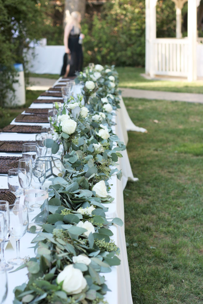 Fleurie Flowers, Reedley, California - Head Table with a garland of foliages and white roses