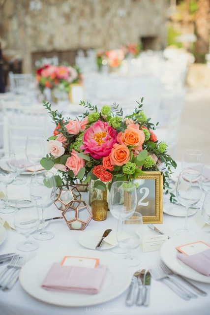 Florenta Floral Design - Centerpiece with orange and coral flowers