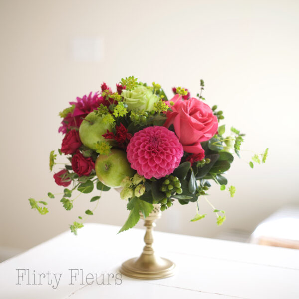 Bella Fiori Wedding Flowers Washington State - green and pink floral centerpiece on gold pedestal