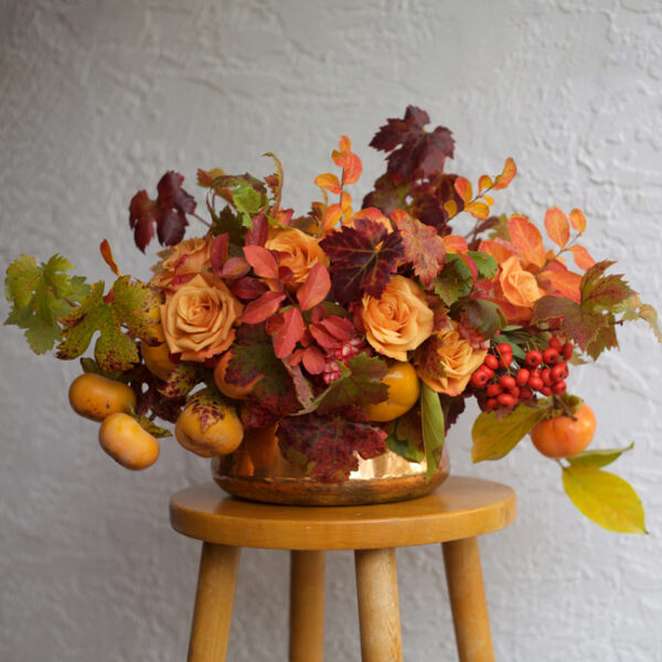 Bella Fiori - Autumn inspired orange arrangement with roses and persimmons