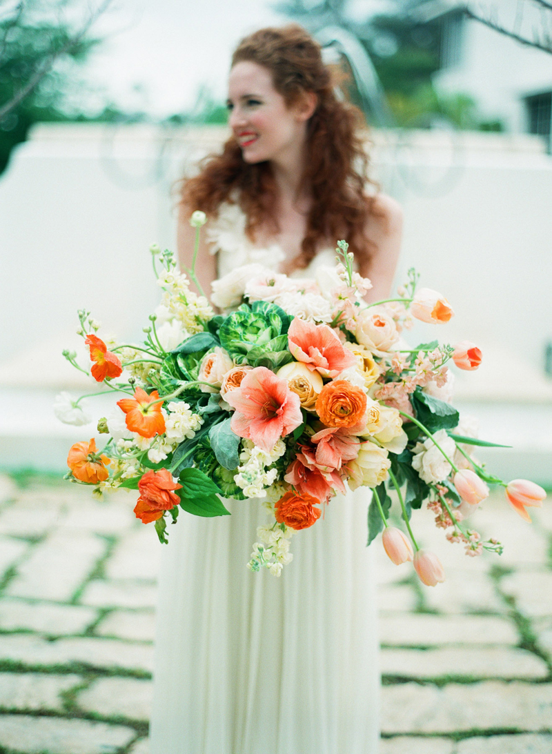 Myrtie Blues Floral Design, Florida. Lauren Kinsey Photography. Bridal Bouquet of orange and peach flowers.