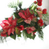 flirty fleurs poinsettia, tulip and carnation floral arrangement