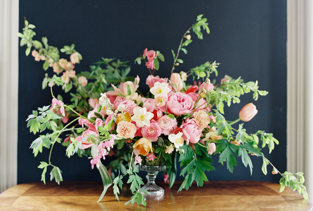 Form & Fire, a floral designer located in Frederick, Maryland. Beautiful floral design with pink ranunculus, peonies, daffodils, carnations, bleeding hearts.