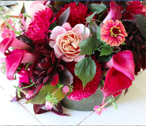 flirty fleurs burgundy and pink floral arrangement